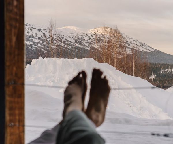 A person meditating peacefully outdoors, feeling calm and balanced.